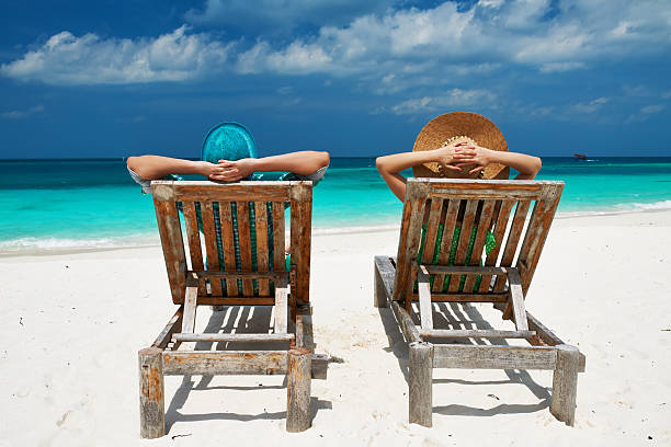 istock Couple in green on a beach at Maldives 502758063