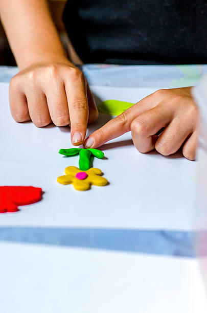 istock children playing with modeling clay, colour image 502758067