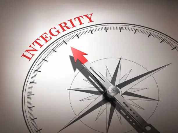 Vector illustration of abstract compass needle pointing the word integrity