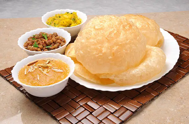 A delicious and tasty Halwa Puri most favourite Breakfast of Indian and Pakistani People.