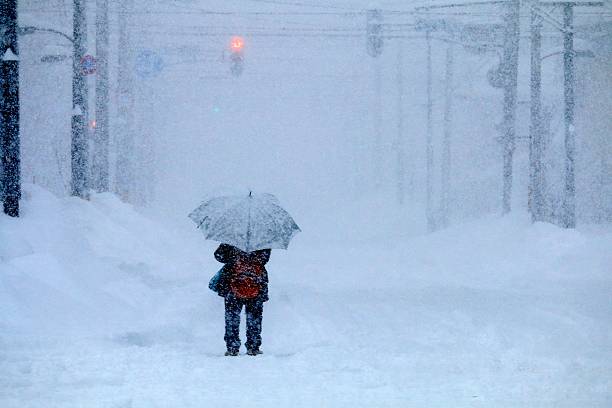 istock Snowstorm and women 502765062