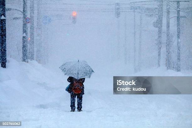 Snowstorm And Women Stock Photo - Download Image Now - Blizzard, Winter, Snow