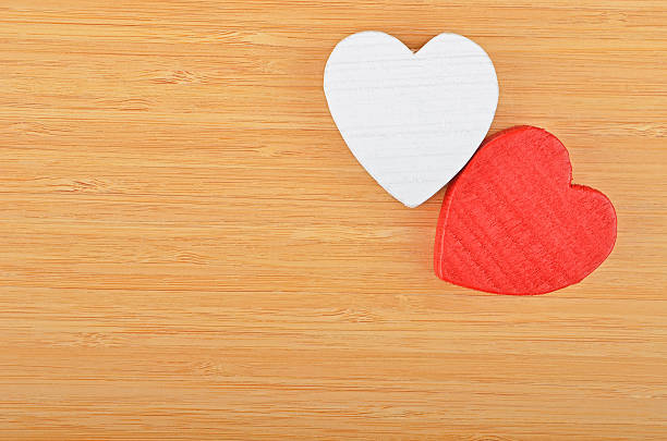 istock Heart on wooden background 502765244