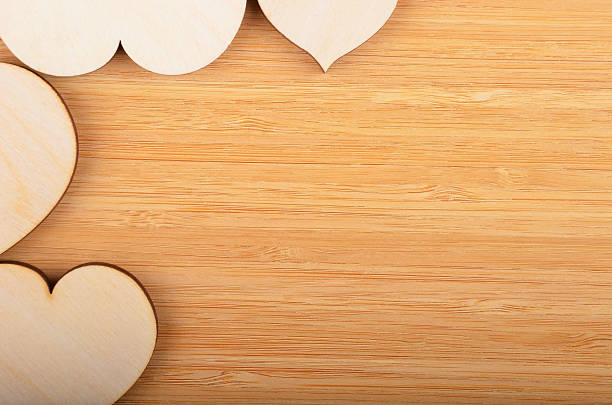 istock Heart on wooden background 502765302