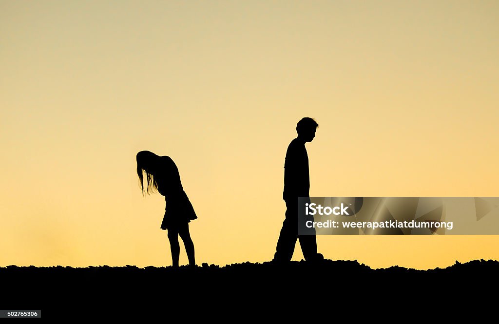 couple ending relationship Silhouette of a couple ending relationship / Couple break up Couple - Relationship Stock Photo