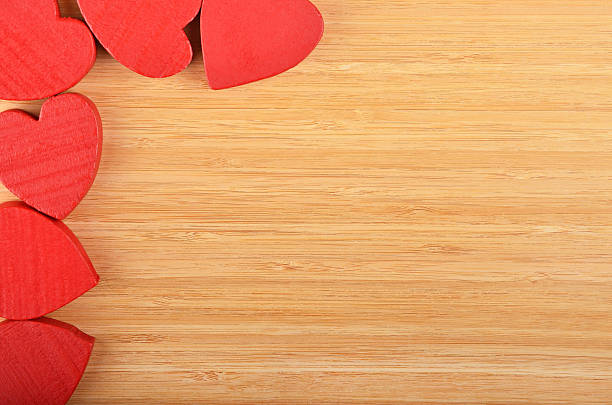 istock Heart on wooden background 502765514