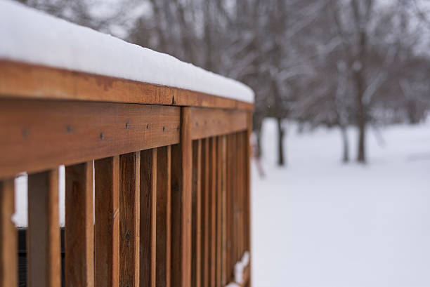 istock golden brown colored patio deck railing during winter 502778200