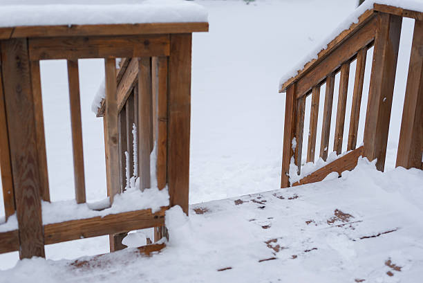 istock golden brown colored patio deck with railing during winter 502778212