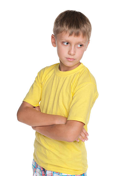 istock Pensive young boy looks aside 502779230