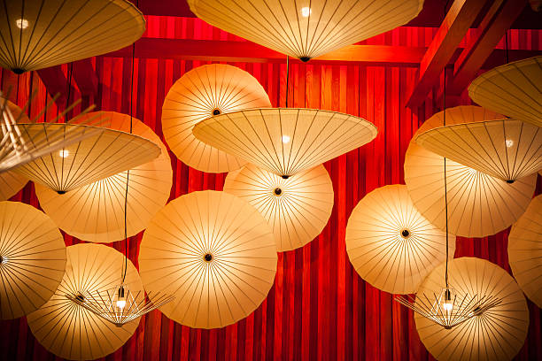 istock Umbrella lamp lighting and red wall 502779616