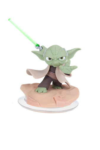 Adelaide, Australia - December 27, 2015: A studio shot of a Yoda Disney Infinity 3.0 Figurine from the Star Wars movies. Marvel comics and movies are extremely popular worldwide.