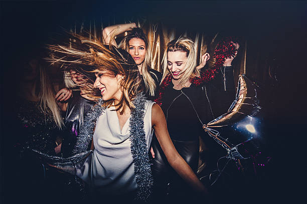 Girls night out Young group of women dancing in a nightclub entertainment club stock pictures, royalty-free photos & images