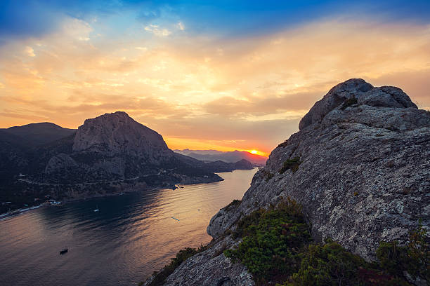 istock Sunrise in mountains and sea 502781292