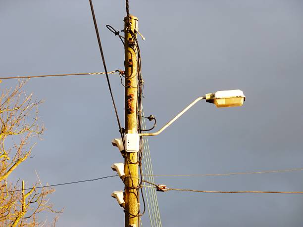 istock telephone line with street lamp 502781428