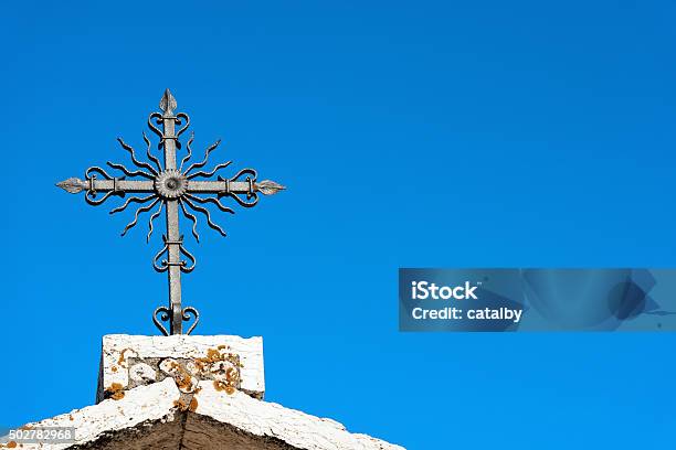 Wrought Iron Cross On Blue Sky Stock Photo - Download Image Now - 2015, Architecture, Black Color