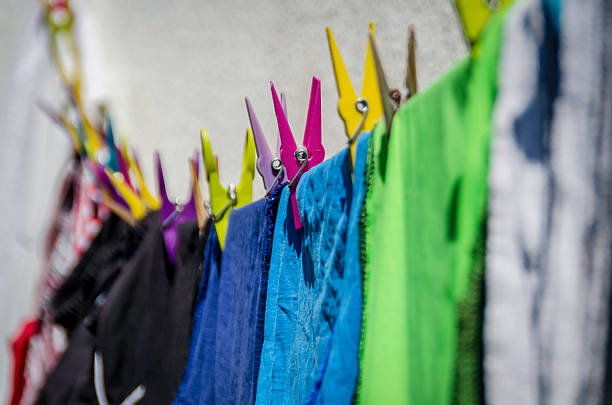 istock washing line, with clothes and pegs, colour image 502784205