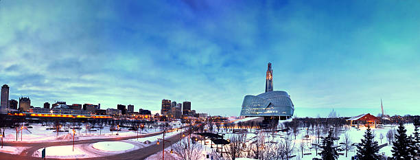 The Winter Sunset A sunset on Christmas day in Winnipeg. The Museum of Human Rights and downtown high-rise buildings can be seen in the background. manitoba photos stock pictures, royalty-free photos & images