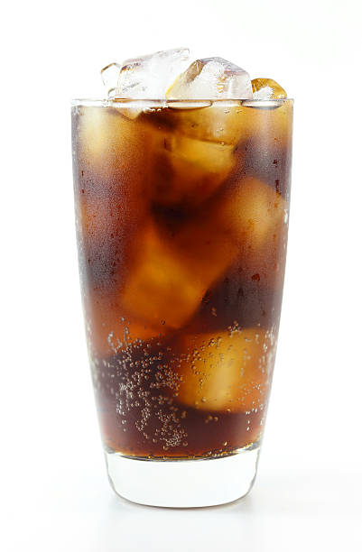 istock Cola glass with ice cubes on a white background 502785081