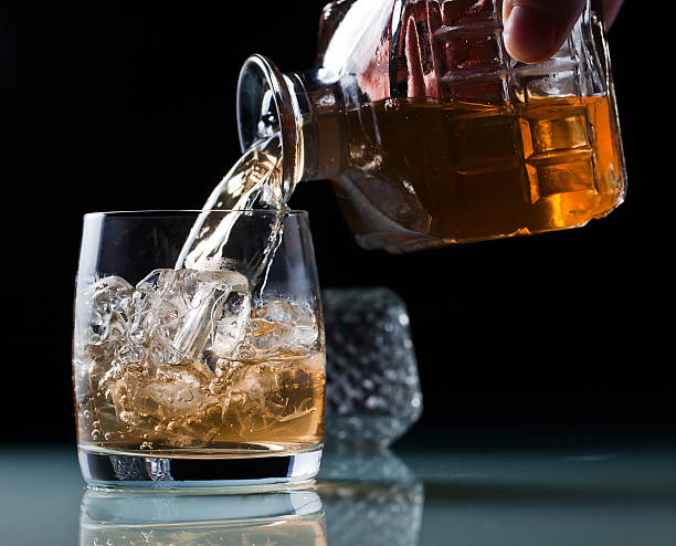 istock glass with whiskey 502785327