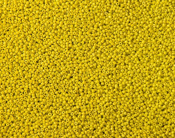 istock Abstract background of closeup varicolored small beads 502785543