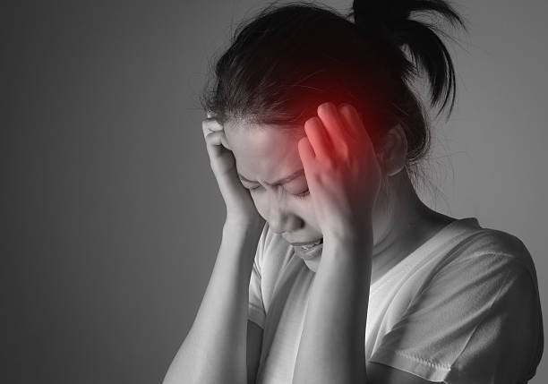 istock Young asian woman having a headache 502785652