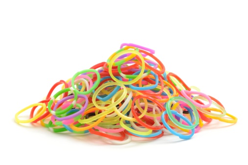 A pile of loom bands isolated on a white background.