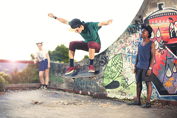 istock Skater in movement making a trick with friends 502785875