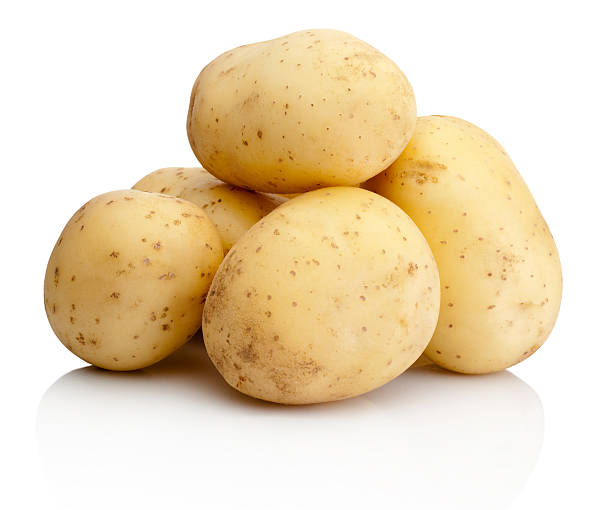 istock Fresh potatoes isolated on white background 502786893