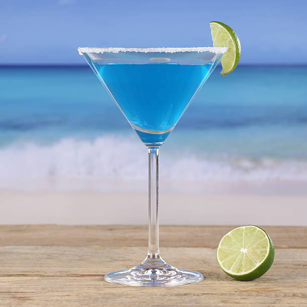 istock Blue Curacao cocktail drink on the beach 502786955
