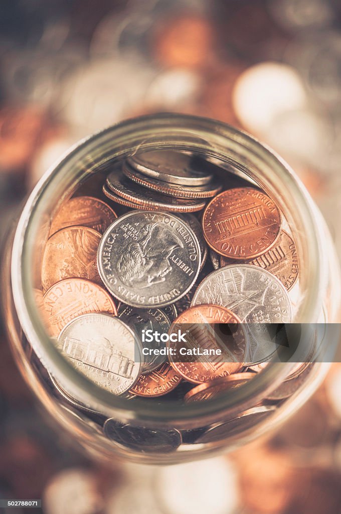 Cash Jar Filled with Cash Donations Abundance Stock Photo