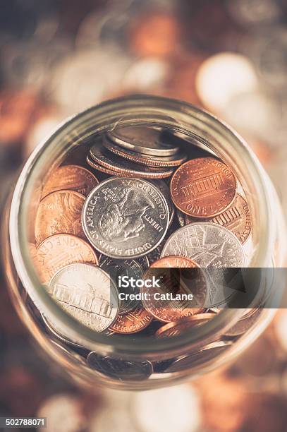 Cash Jar Filled With Cash Donations Stock Photo - Download Image Now - Abundance, American Culture, Assistance