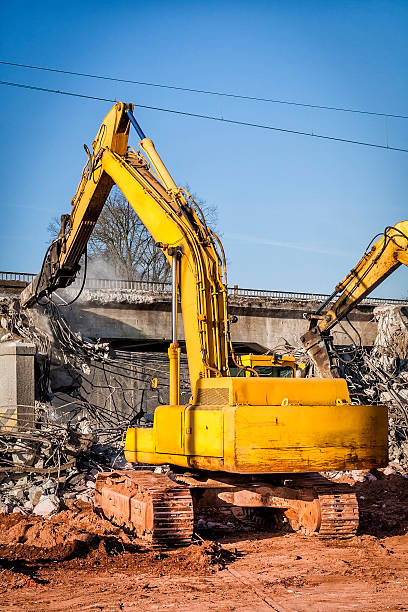 istock Excavators destroy the old viaduct 502788390