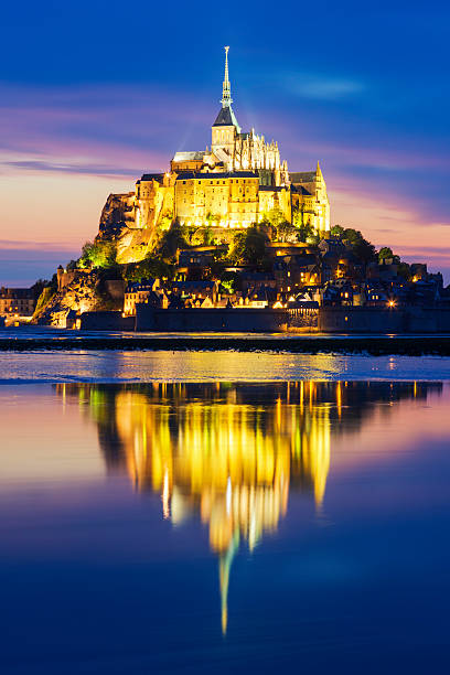istock View of famous Mont-Saint-Michel by night 502790162