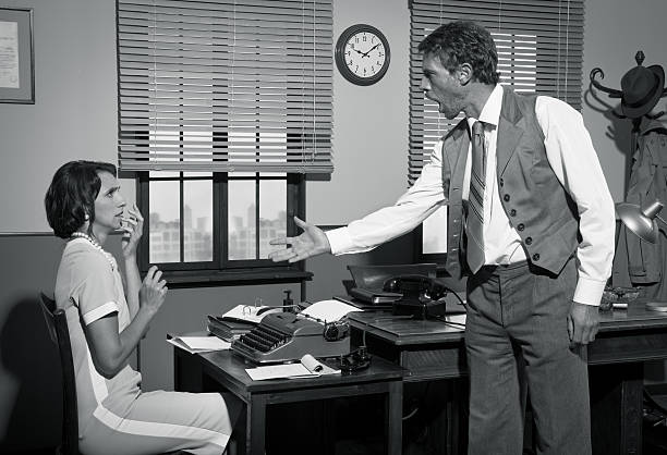 istock Boss arguing with young secretary in the office 502790266