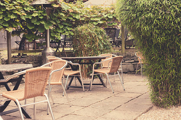 istock Chairs and tables in a garden 502790311