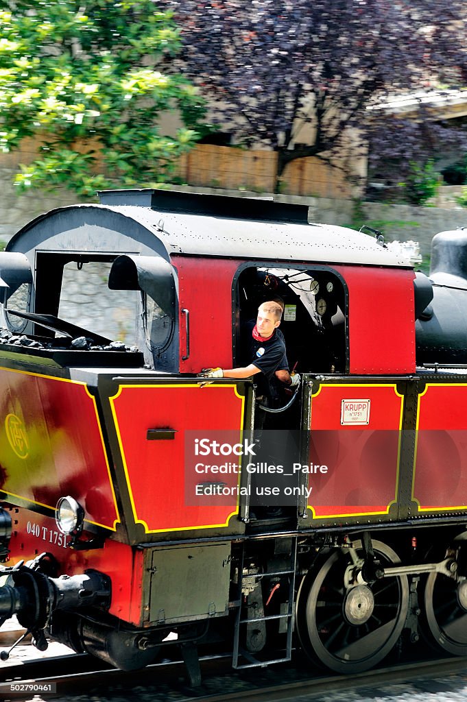 The steam locomotive Anduze, France - July 14, 2014: The steam from the small tourist train from Anduze prepares for his trip to do in Saint-Jean-du-Gard. Anduze Stock Photo