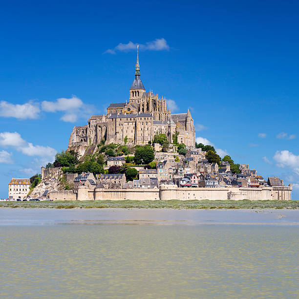 istock Mont-Saint-Michel with blue sky 502790810