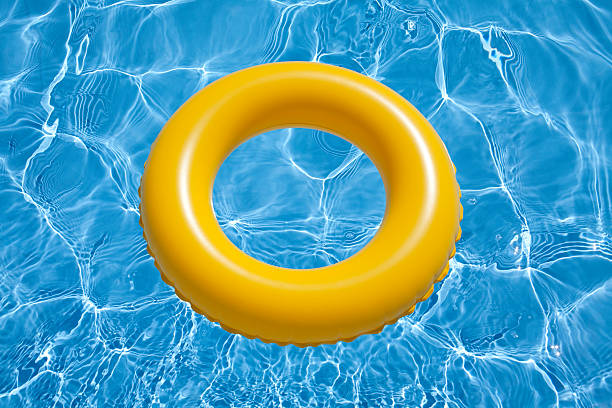 boia de pneu - inflatable ring water wings swimming pool float imagens e fotografias de stock