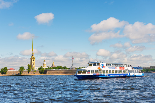 Saint Petersburg, Russia - June 23, 2015: Peter and Paul Fortress view from Neva river with ferryboat,