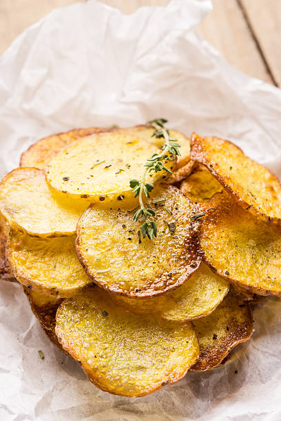 istock Homemade potato chips with spices 502809704