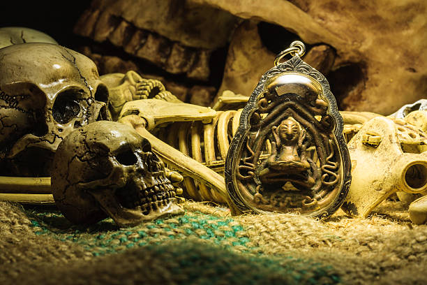 istock small buddha with human skull still life background 502810276