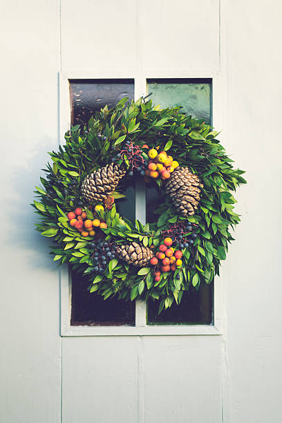 istock Christmas wreath decoration hanging on door 502813350