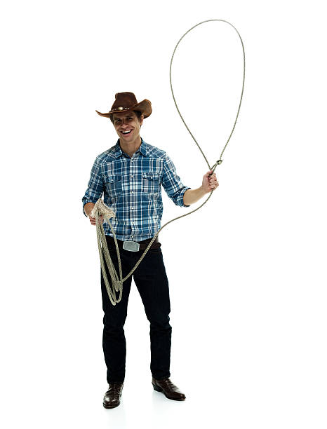 istock Happy cowboy swinging lasso 502813996