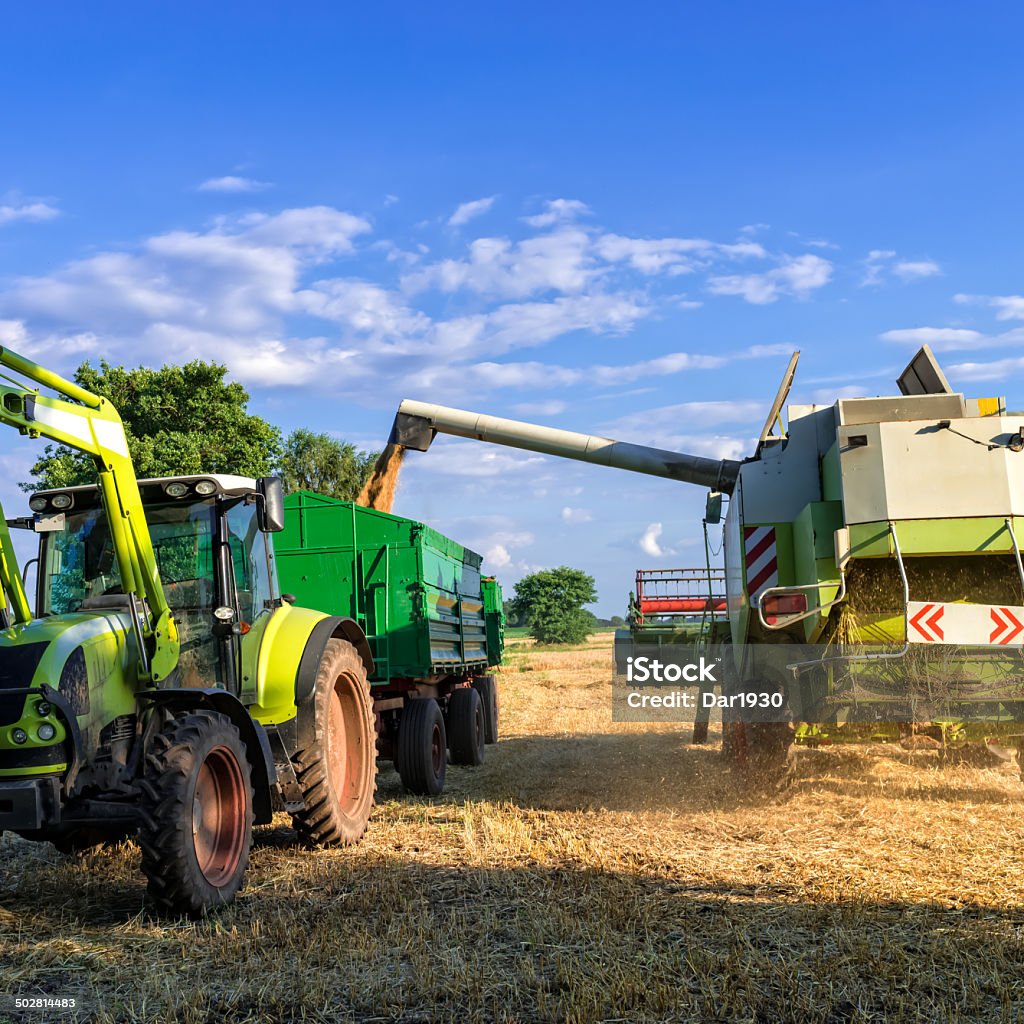 Tracteurs et de récolter - Photo de Agriculteur libre de droits