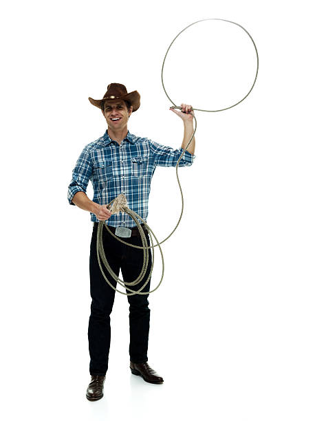 istock Happy cowboy swinging lasso 502817860