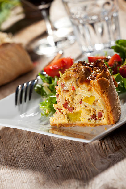 istock fresh quiche lorraine on a wooden board 502818677