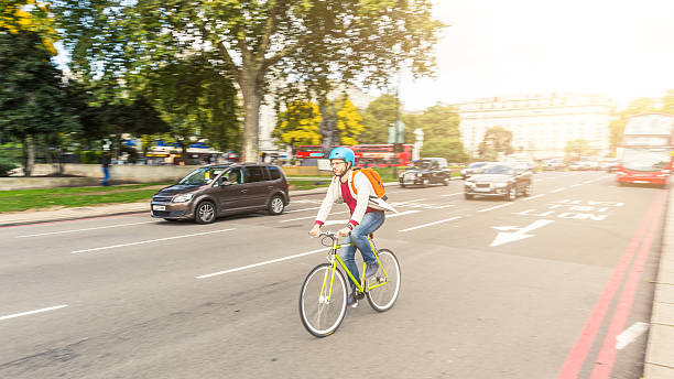 istock Hipster man cycling in London 502818894
