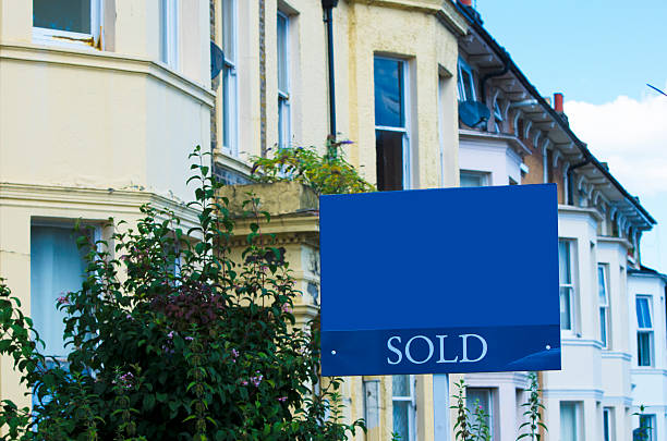 istock British houses with sold sign 502818919