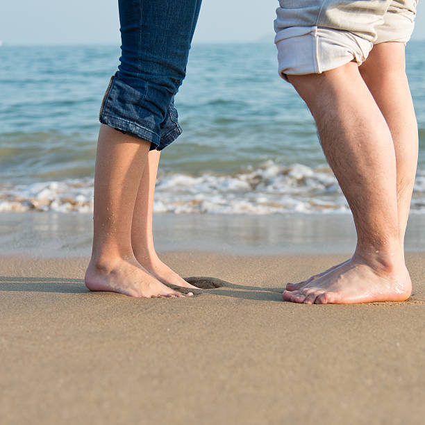 Couple kissing on the sandy beach