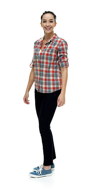 istock Smiling female standing and looking at camera 502819040